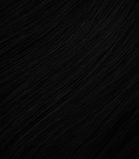 Close-up of black hair showing texture and color match for Hair Genetics Root Cover Up